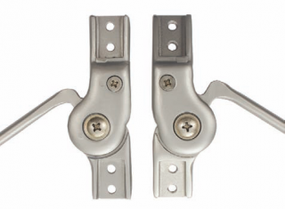 Swiss type springles knee joint with manual lock for orthotic applications